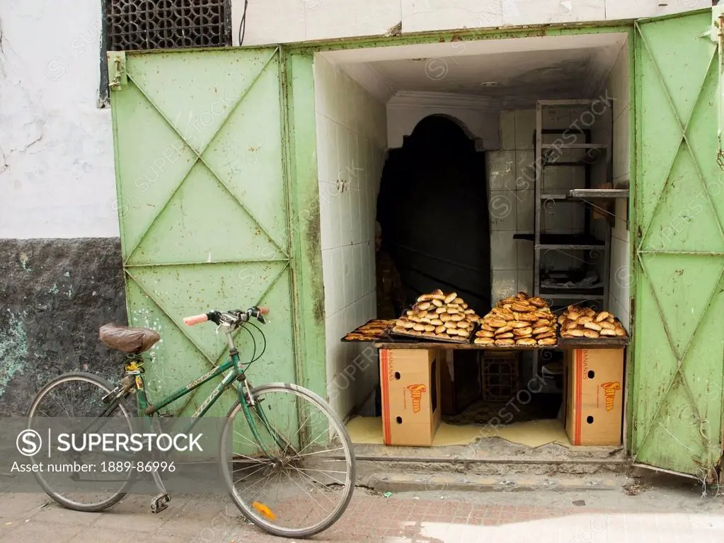 Morocco, Casablanca, Bread For Sale In Shop With Bicycle Outside; Old Medina