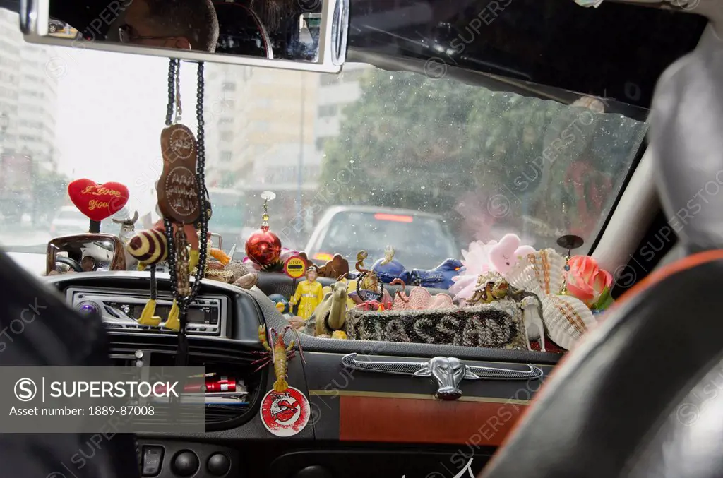 Morocco, Taxi With It's Dashboard Filled With Various Trinkets; Casablanca