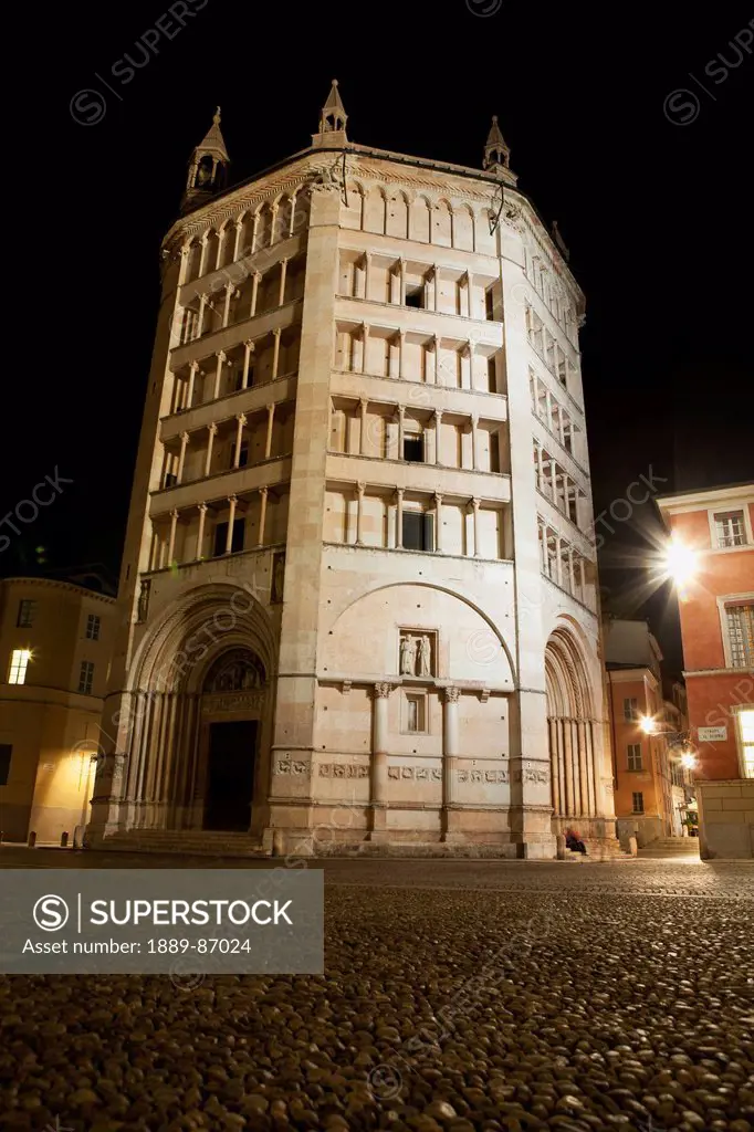 Italy, Emilia-Romagna, Low Angle View Of Marble Octagonal Baptistery At Night; Parma