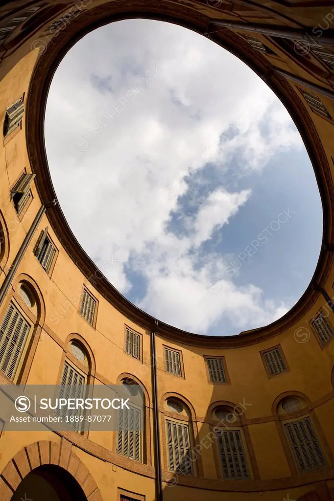 Italy, Emilia-Romagna, Upward View Of Oval Opening Inner Yard; Ferrara