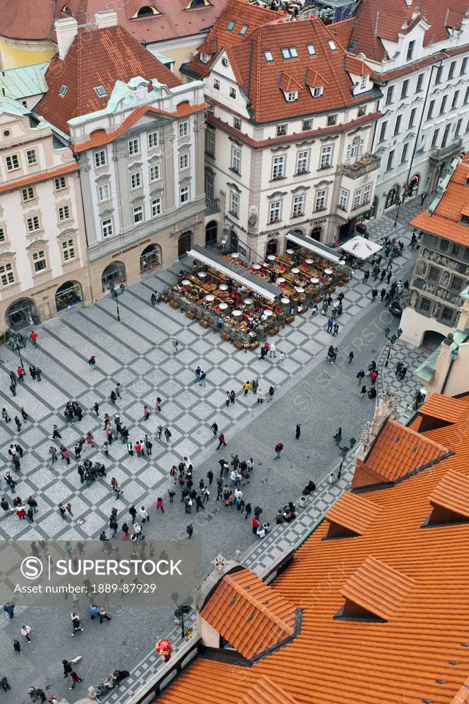 Czech Republic, High Angle View Of Pedestrians In Town Square; Prague