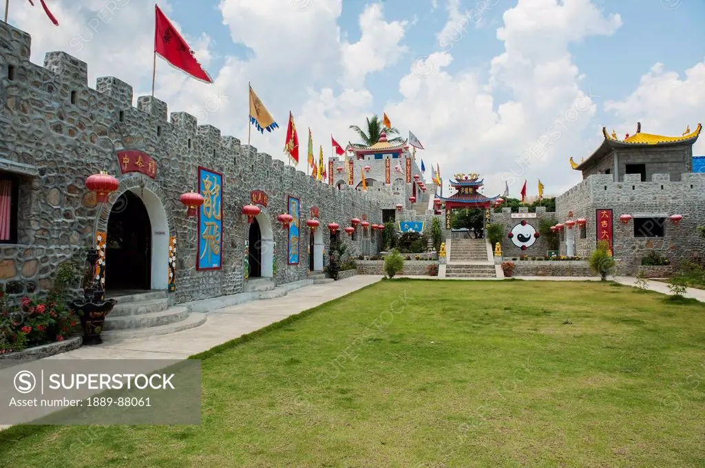 Thailand, Flags And Lanterns Line Outside Of Building In Chinese Village; Shandicun