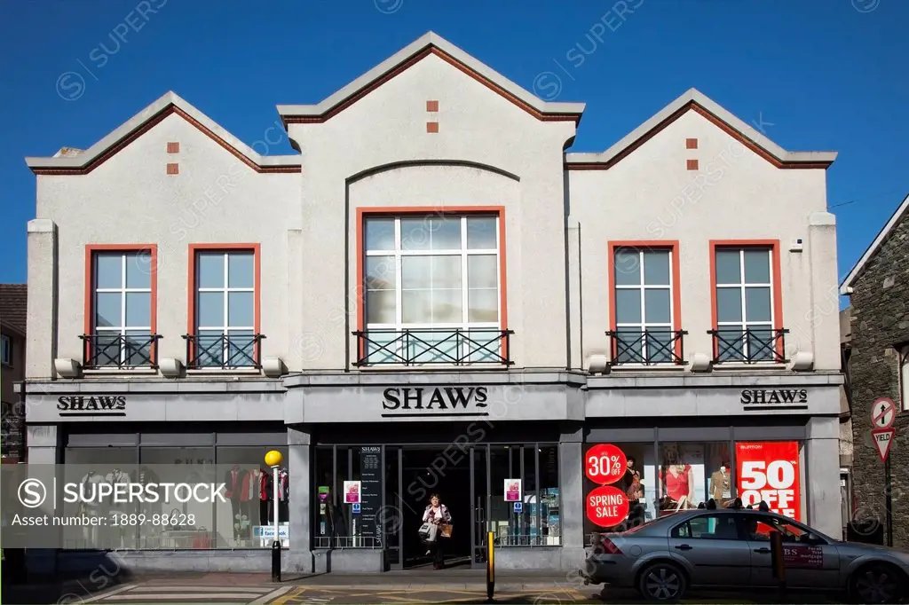 Retail store with sale signs in the front window;Tralee county kerry ireland