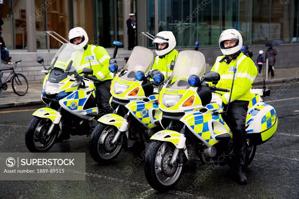 Three policemen on motorcycles on the street;Dublin county dublin ireland
