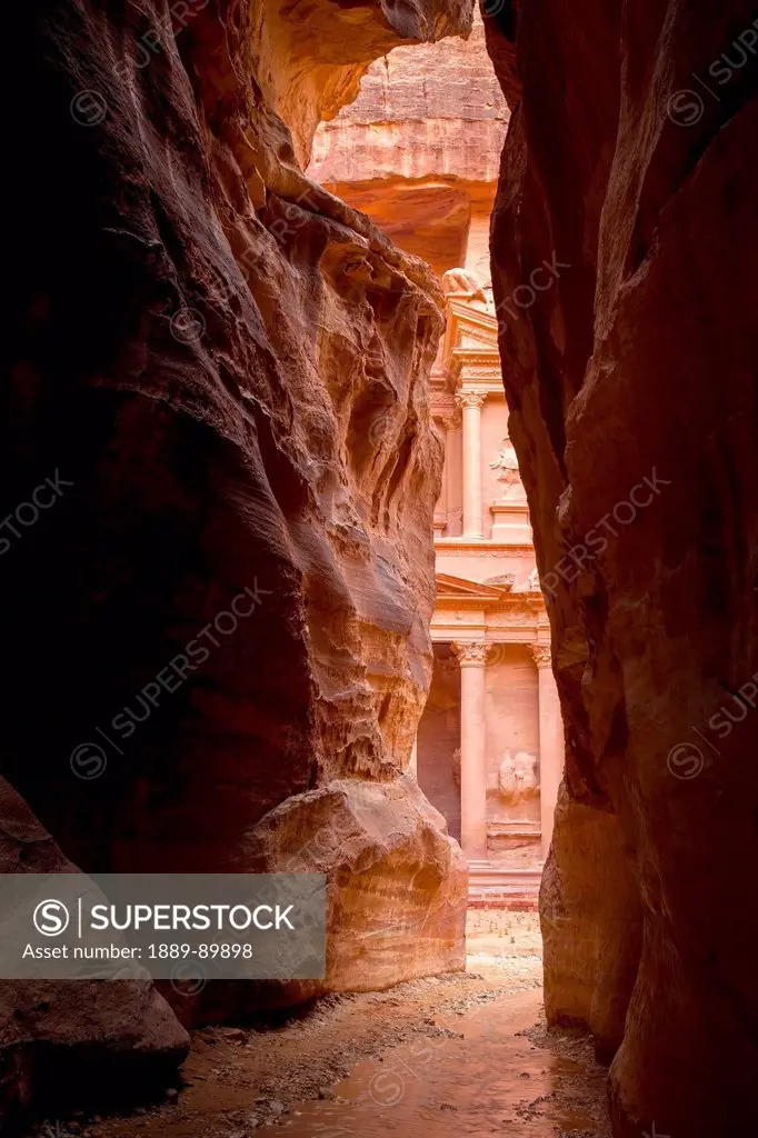 Al Khazneh seen from natural narrow canyon; Petra, Jordan