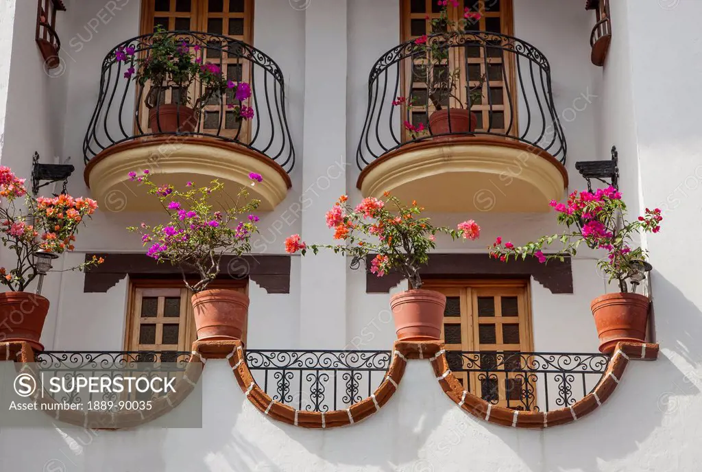 Wrought iron decorations and flower pots; Puerto Vallarta, Mexico