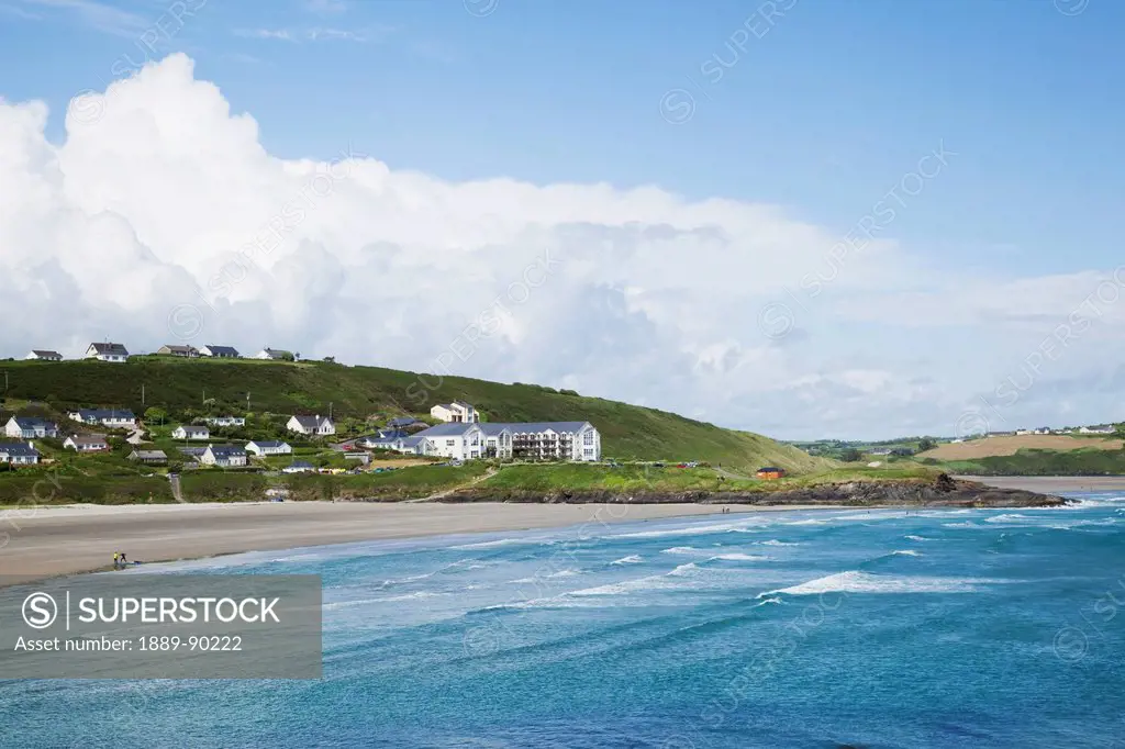 View of the ocean and buildings along the coast;Inchydoney county cork ireland