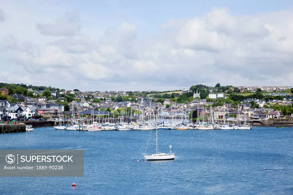 Many boats mooring in a harbour;Kinsale county cork ireland