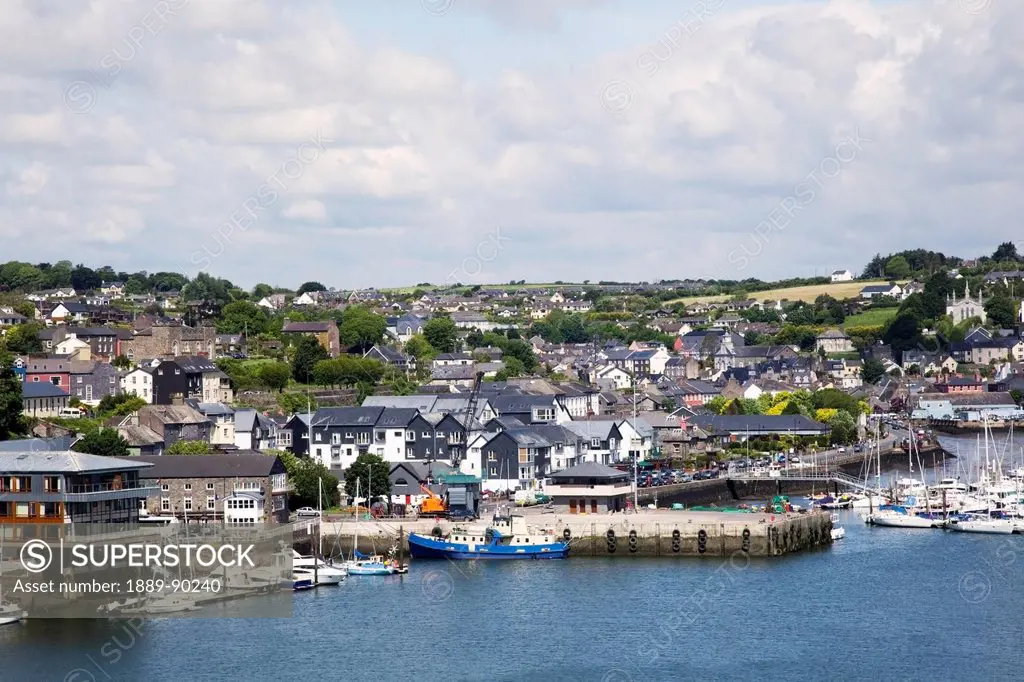 Boats in the harbour and the waterfront;Kinsale county cork ireland