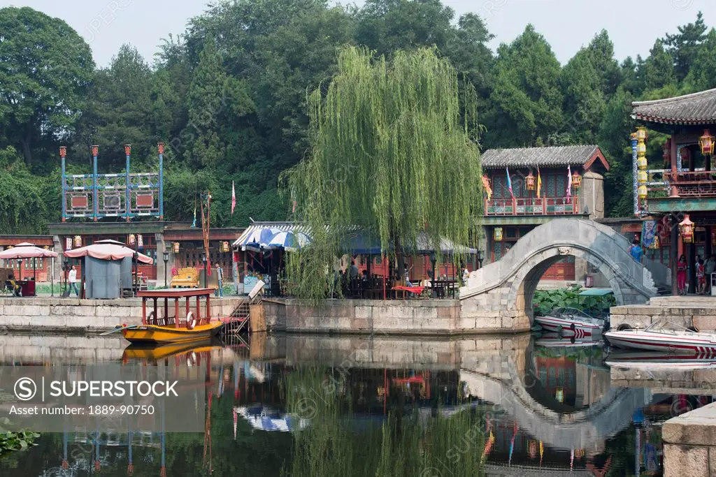 Along the shoreline of a tranquil river; Beijing, China