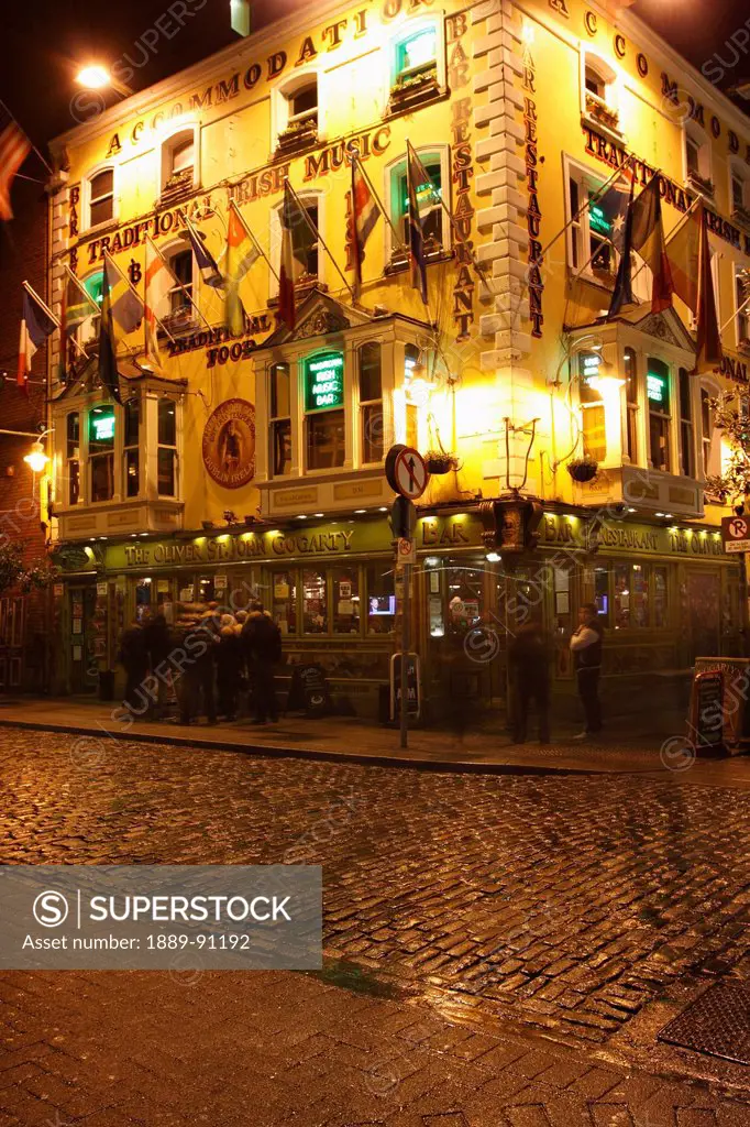 The oliver st. john gogarty pub on a corner illuminated by light at night;Dublin city county dublin ireland