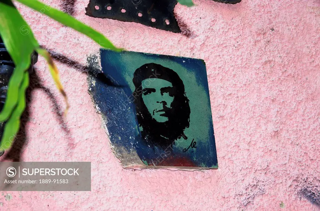 Small Portrait Of Che Guevara On A Pink Stucco Wall In Shop On Callejon De Hamel; Havana, Artemisa, Cuba