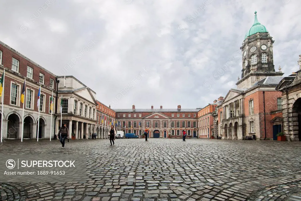 Pedestrians in a city square; Dublin, Ireland