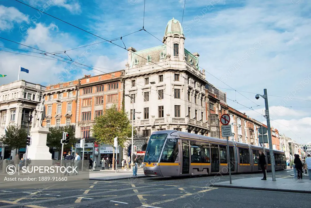 Public transit train on a street; Dublin, Ireland