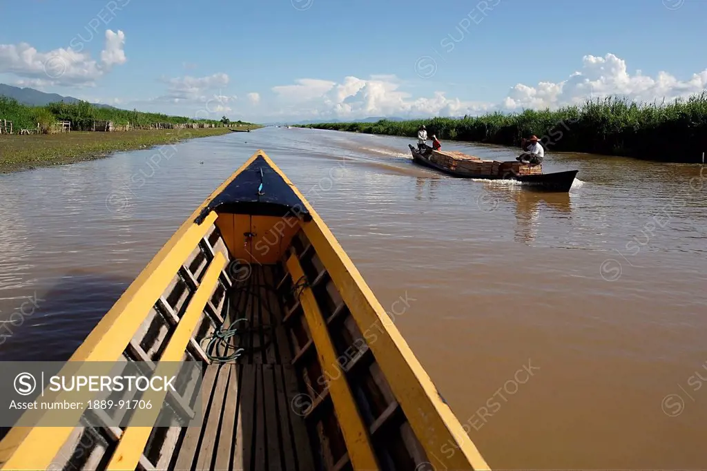 Travellers Use Boats To Move Along The Canals Of Inya Lake; Shan State, Myanmar