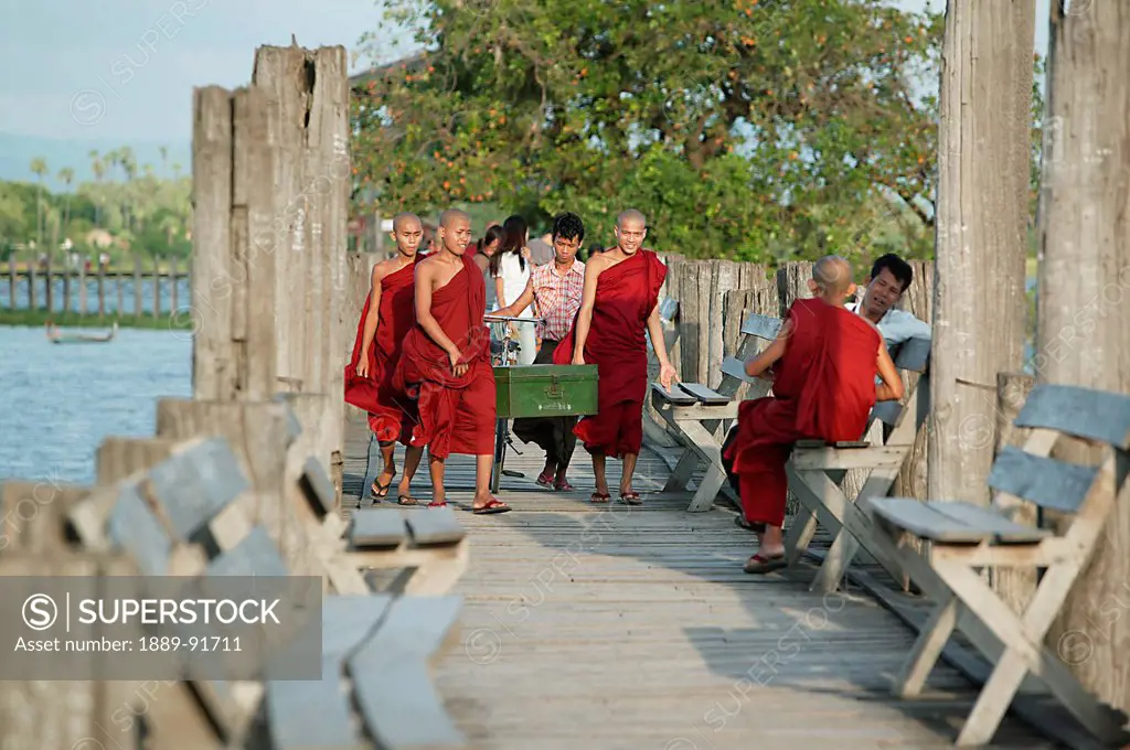 Monks Crossing U Bein Bridge; Amarapura, Mandalay