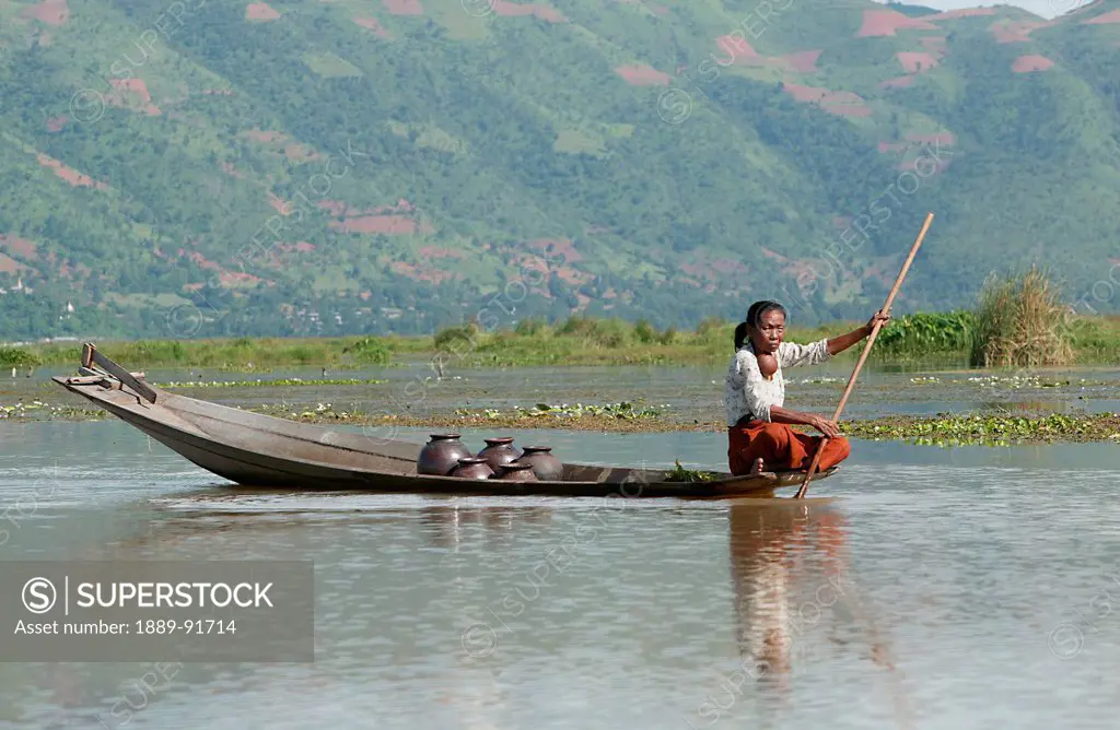 Villagers Travelling By Boat And Working On Canals That Lead To Inya Lake; Shan State, Myanmar