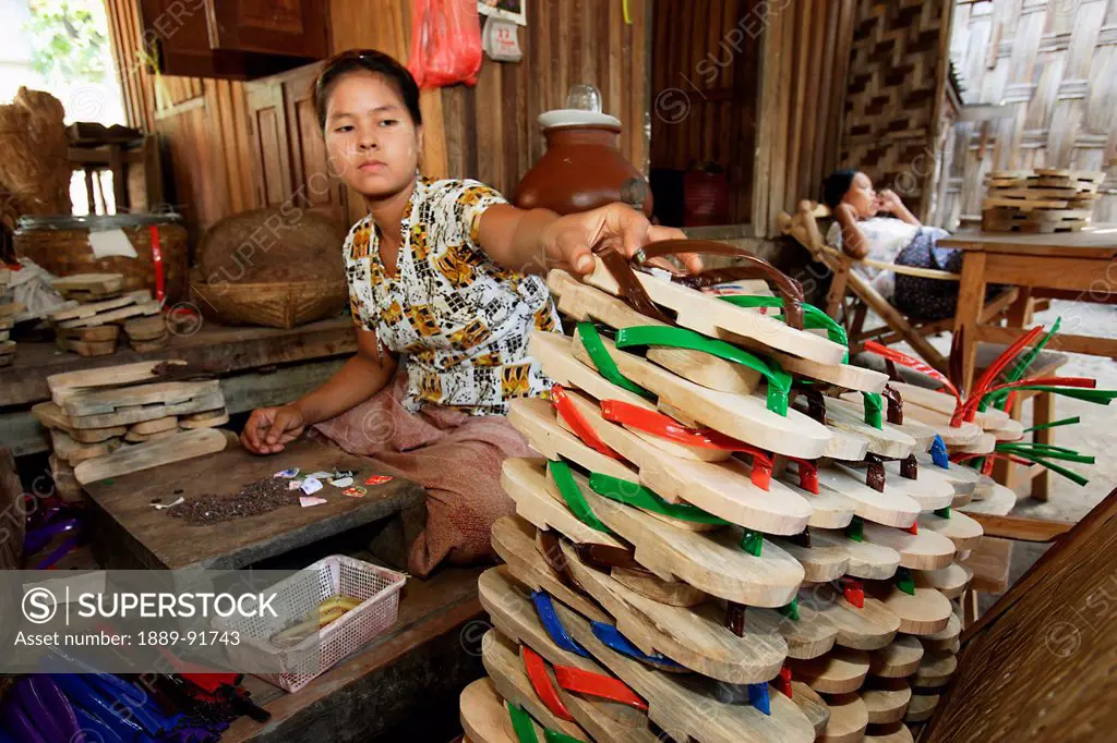 Woman Making Wooden Clogs, Mandalay, Myanmar; Ayeyarwady, Burma