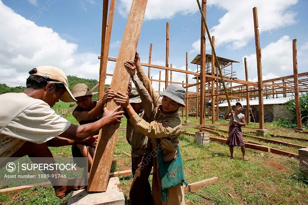 Men Erecting The Wooden Frame Of A Building Near Taunggyi, Ayeyarwady, Myanmar; Ayeyarwady, Burma