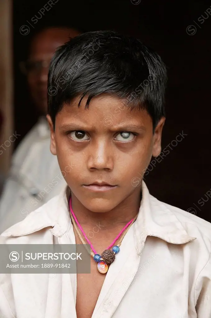 A boy with a cataract; Ratapata Village, Badamba, India