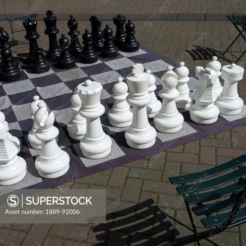 An Over-Sized Game Of Chess On The Ground In Occidental Park; Seattle, Washington, United States Of America