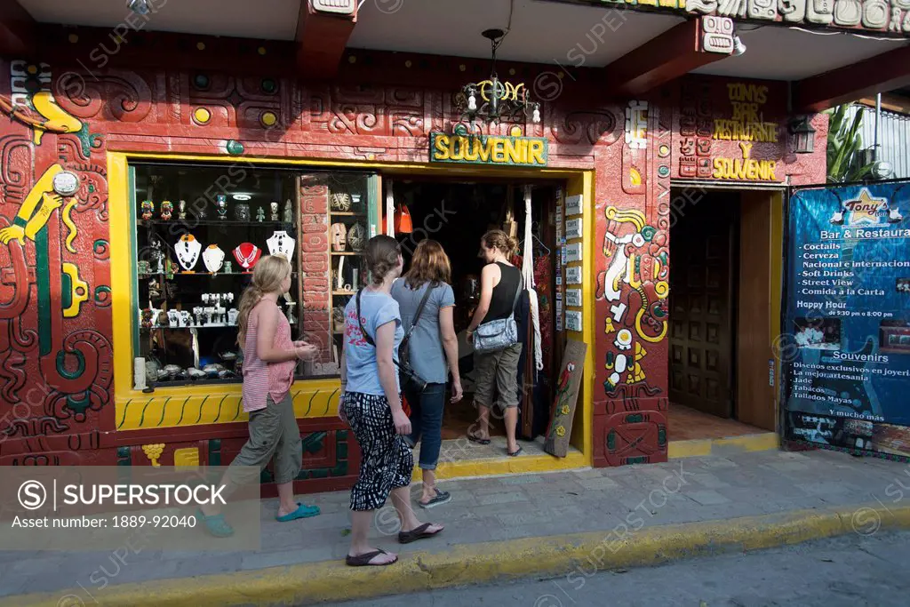 Four Girls Enter A Souvenir Shop; Copan, Honduras