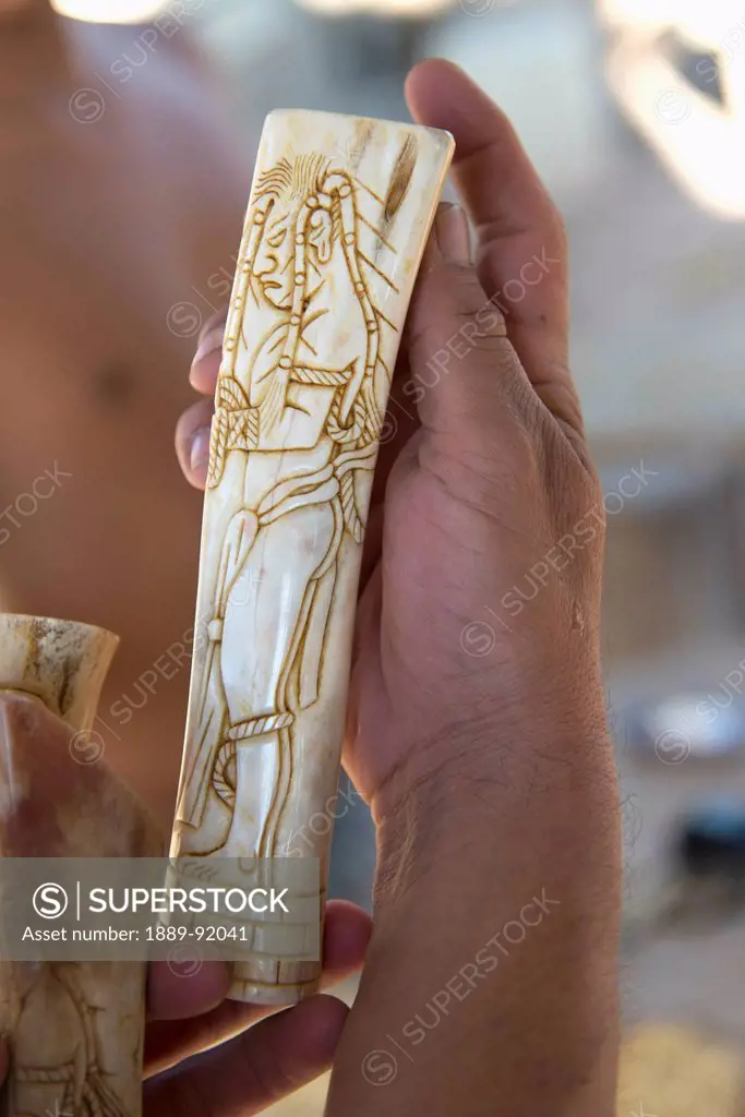 A Hand Holds Carved Handiwork; Copan, Honduras