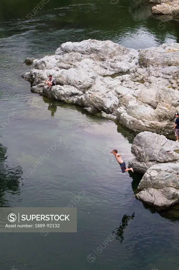 Swimming In One Of The Various Rivers Running Through The Tasman Region Of New Zealand; Abel Tasman, New Zealand