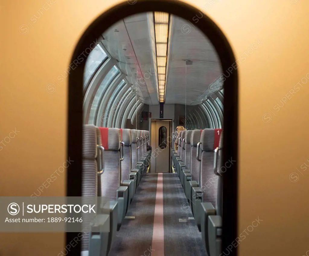 Arched Doorway And Aisle Of A Train Car; Locarno, Ticino, Switzerland