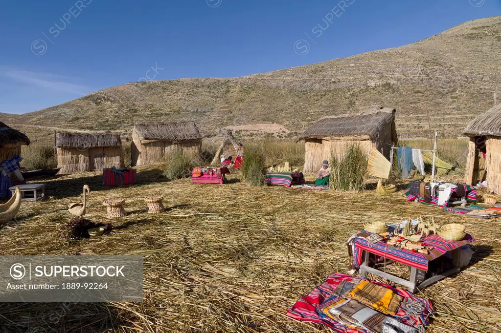 Urus Iruitos people on Chisawa, a reed island made by the Urus Iruitos people in Titicaca Lake, Bolivia