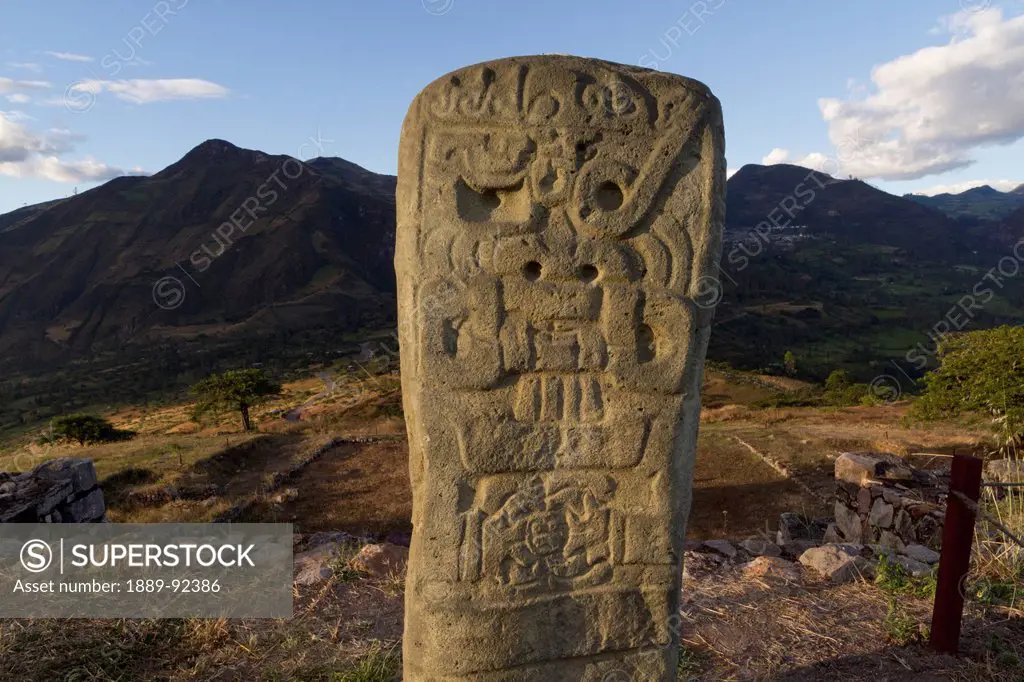 Monolith with Chavin-style bas-reliefs atop the main platform, Kuntur Wasi, Cajamara, Peru