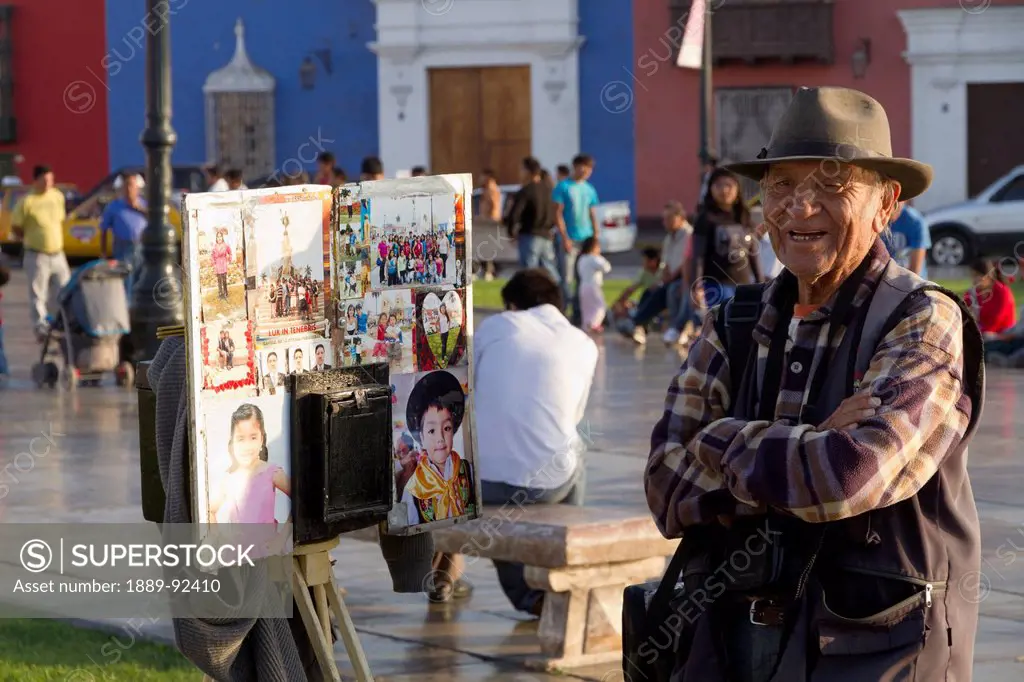Photographer on the Plaza Mayor, Trujillo, Peru