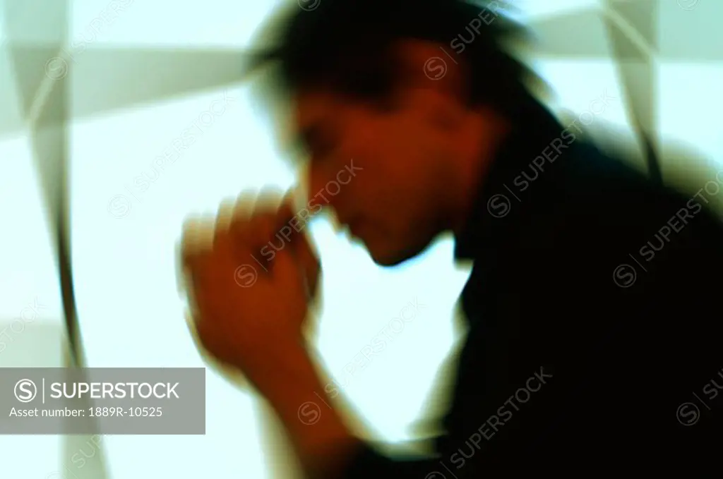 Man praying with motion