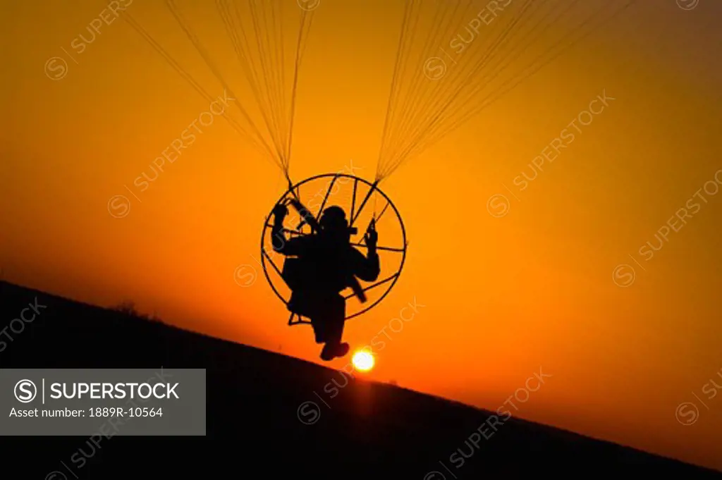 Silhouette of paraglider