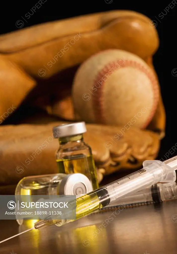 Baseball glove with syringes and vials