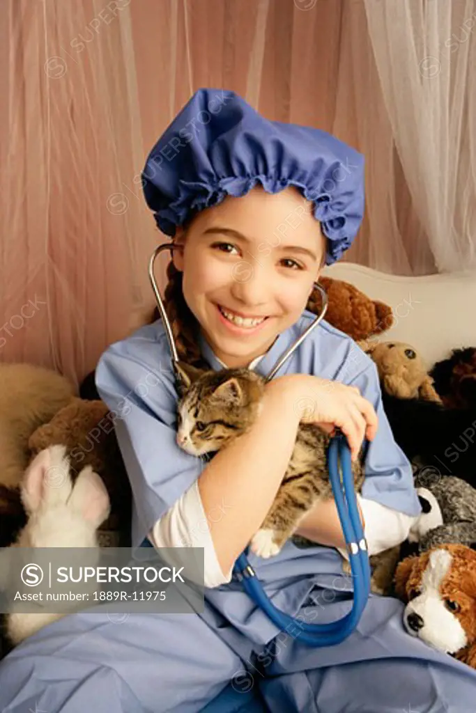 Front view of girl holding cat