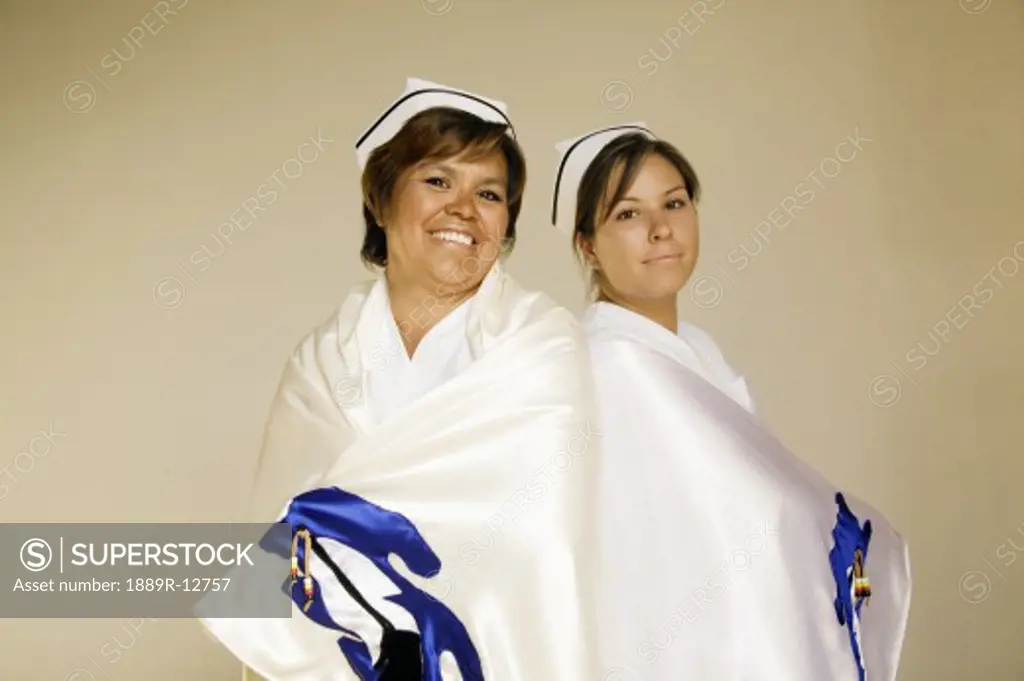 Nurses wearing ceremonial shawls