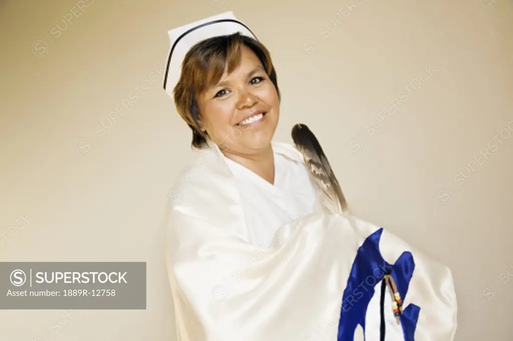 Nurse wearing a ceremonial shawl