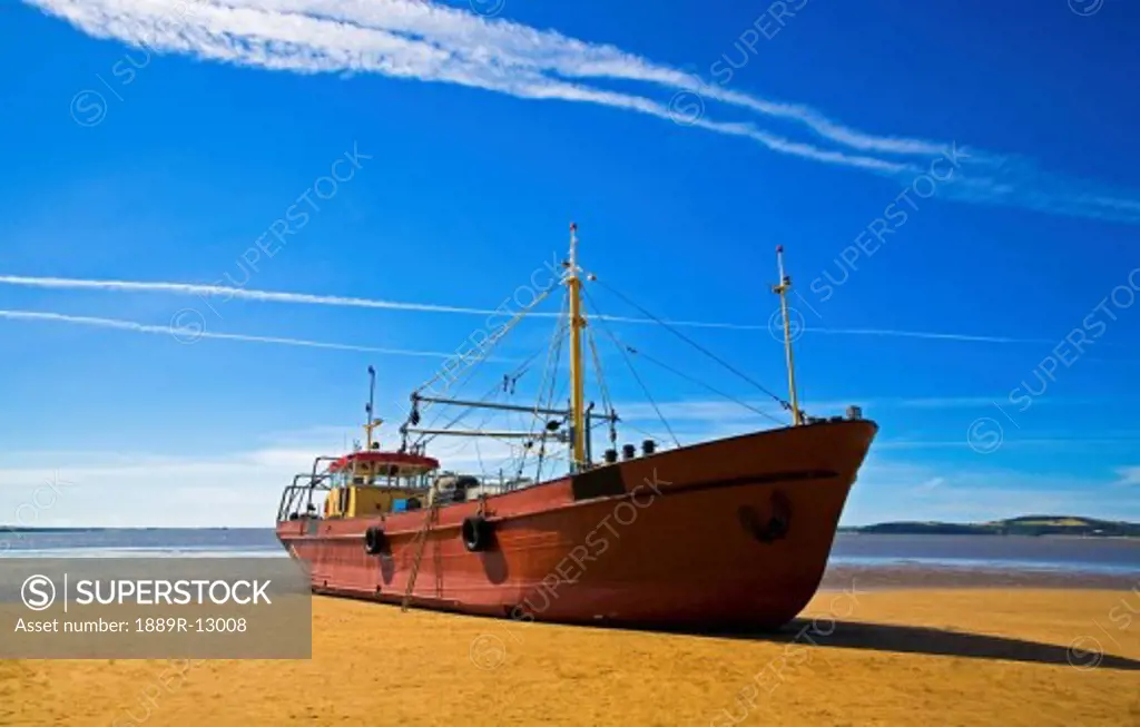 Duncannon strand, Waterford harbour, County Wexford, Ireland; Fishing trawler  