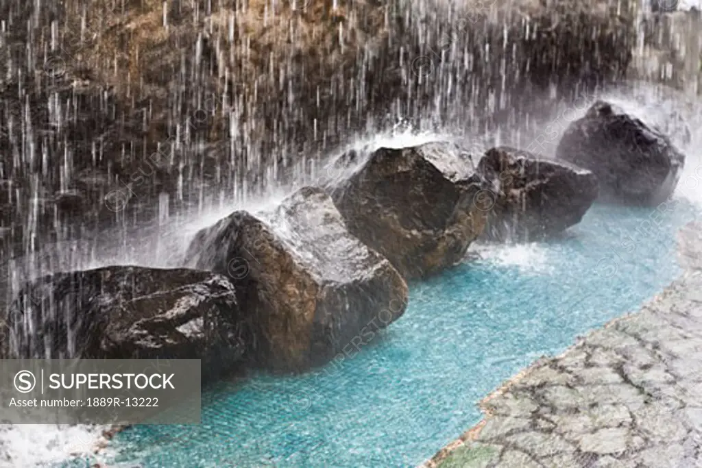 Rocks under waterfall