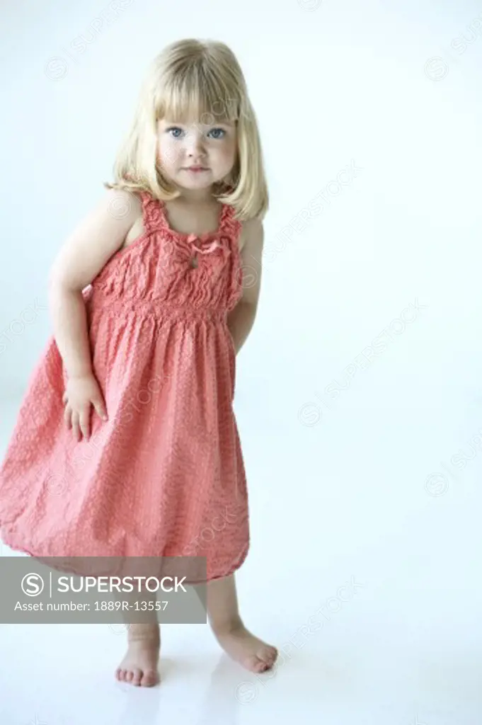 Little girl in a pink dress