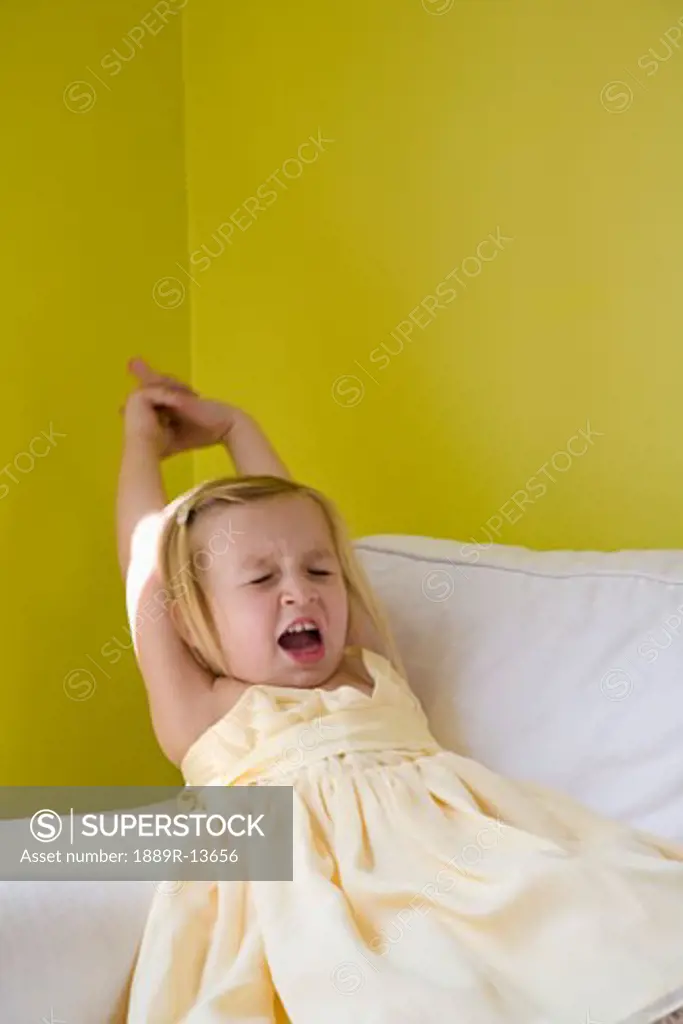 Girl stretching and yawning