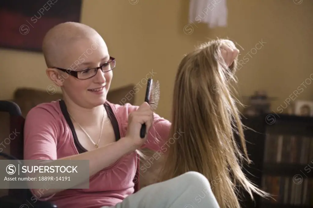 Girl brushing wig