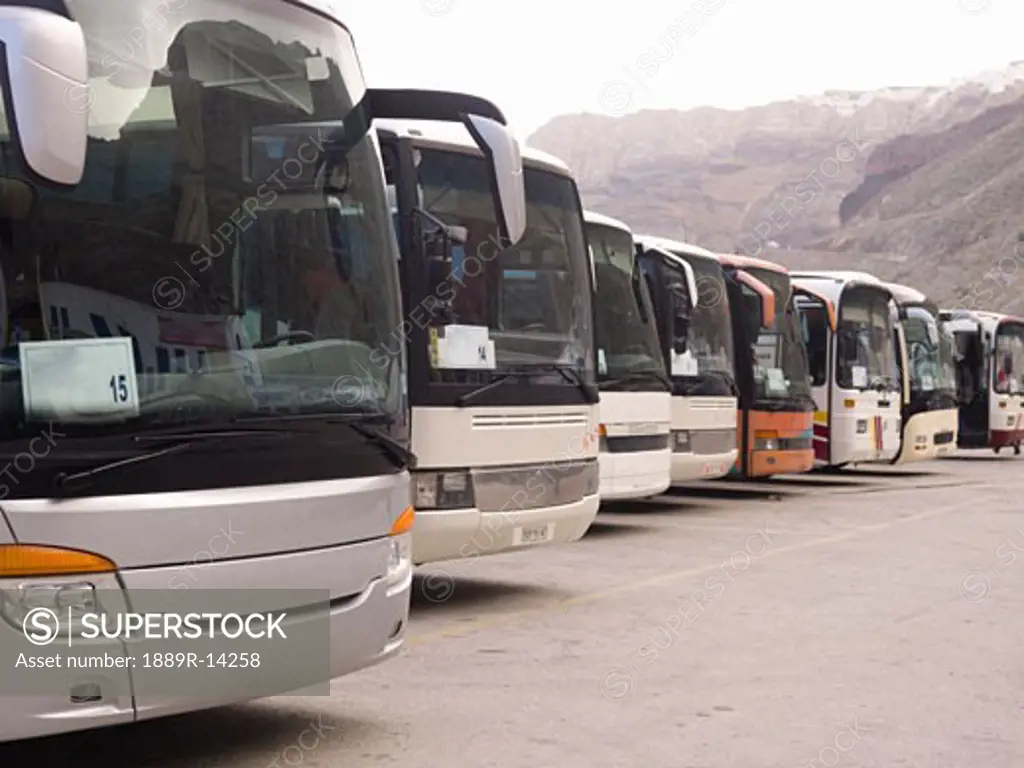 Santorini, Greece; Tour buses lined up