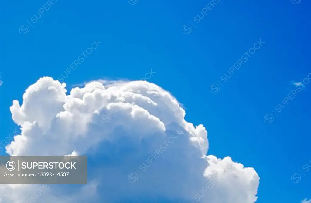Cumulus clouds and blue sky