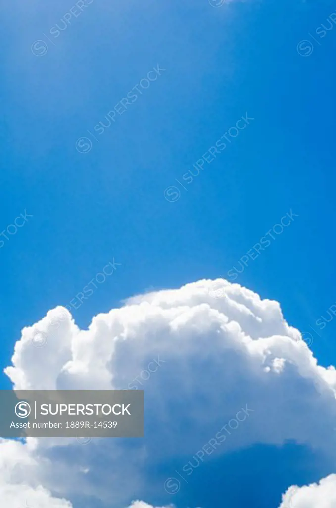 Cumulus clouds and blue sky