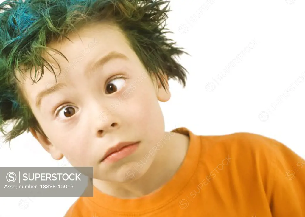 Boy with green hair and crossed eyes