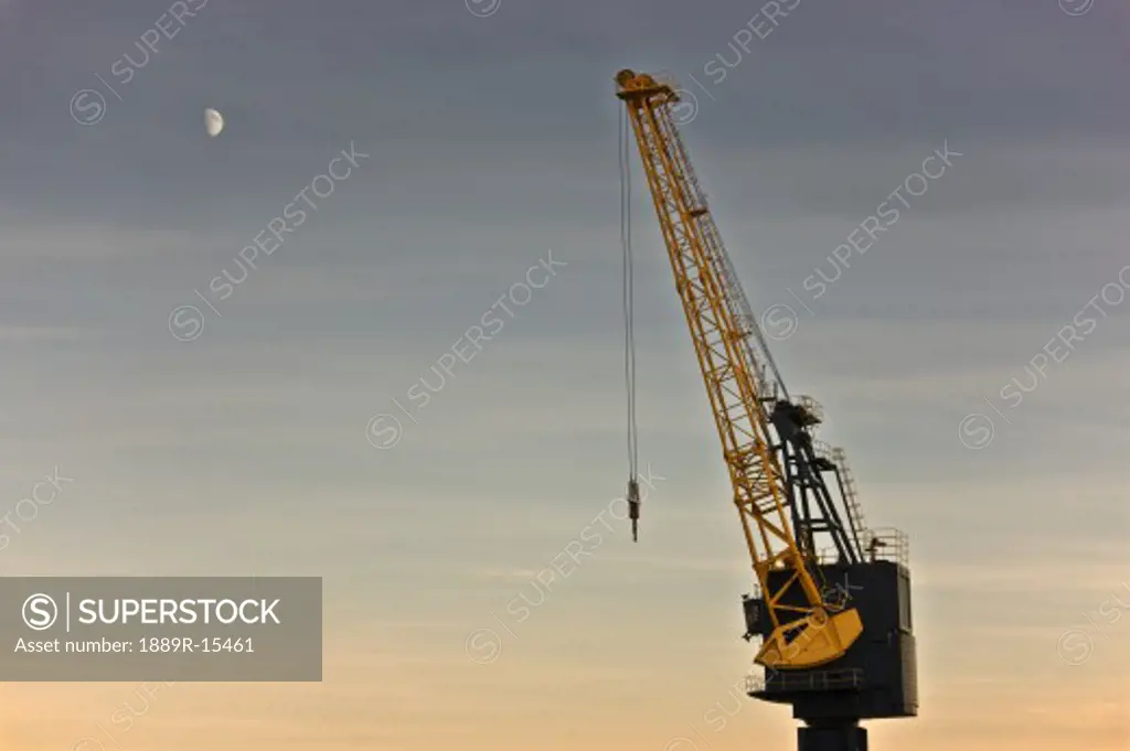 Tyne and Wear, Sunderland, England; Crane against evening sky