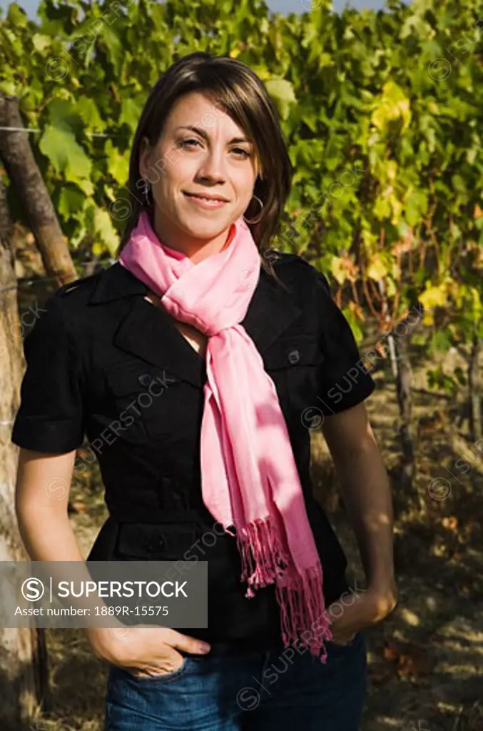 Portrait of a woman in a vineyard