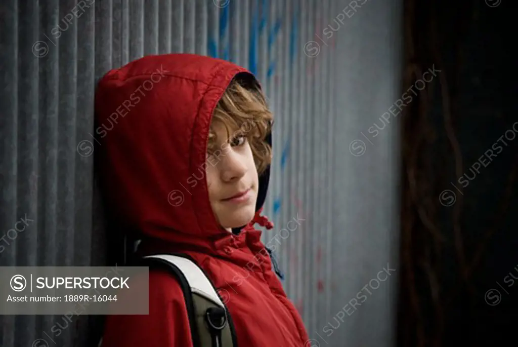 Teenage boy; Boy wearing a hooded jacket